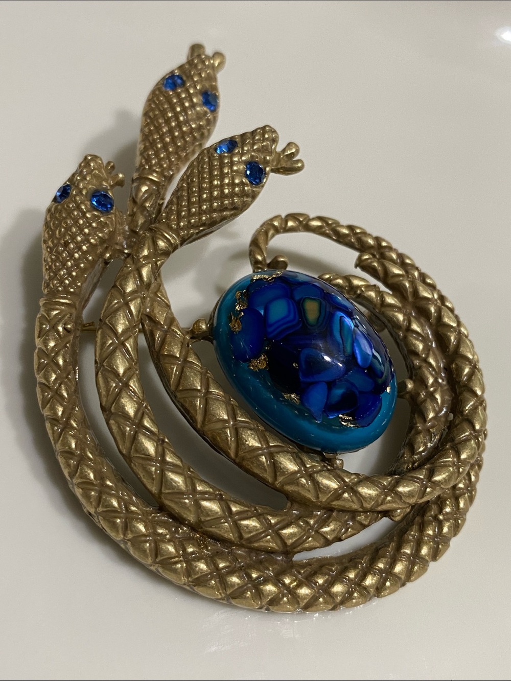 Monet Gold Snake Brooch with Blue Cabochon
